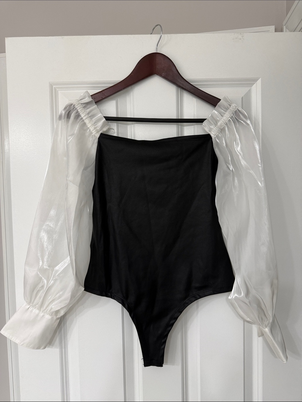 bebe Black Bodysuit with Sheer White Puff Sleeves
